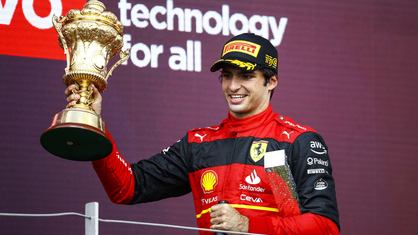 Carlos Sainz, Scuderia Ferrari, portrait celebrating his first victory in F1 podium during the