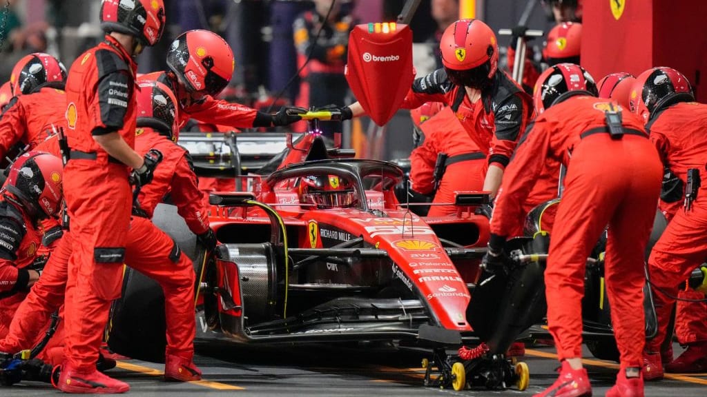 Ferrari's Spanish driver Carlos Sainz Jr makes a pit stop during the Saudi Arabia Formula One Grand