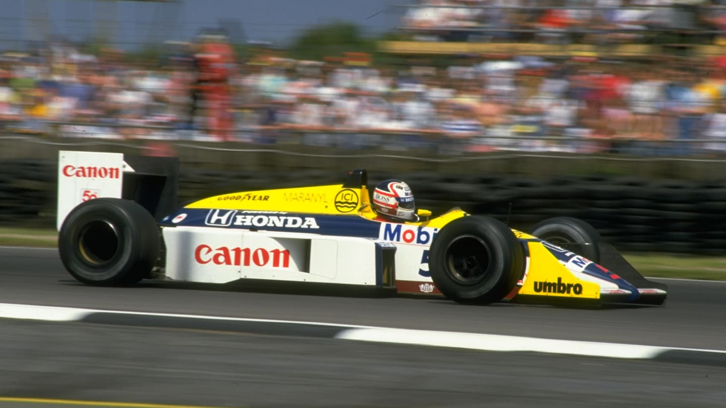1987:  Nigel Mansell of Great Britain in action in his Williams Honda during the British Grand Prix