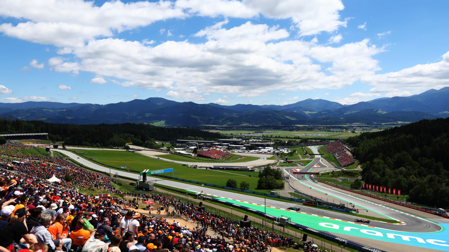 SPIELBERG, AUSTRIA - JULY 08: A general view showing Sebastian Vettel of Germany driving the (5)