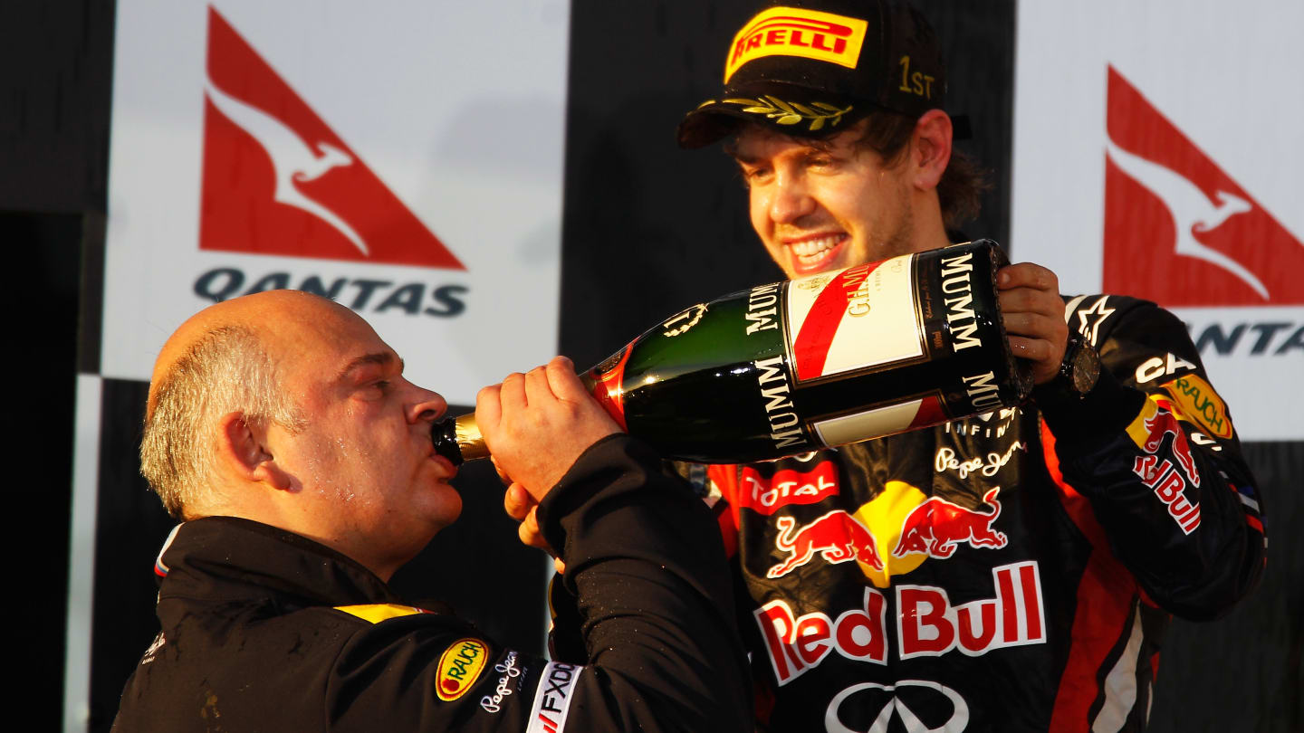 MELBOURNE, AUSTRALIA - MARCH 27:  Sebastian Vettel (R) of Germany and Red Bull Racing celebrates on