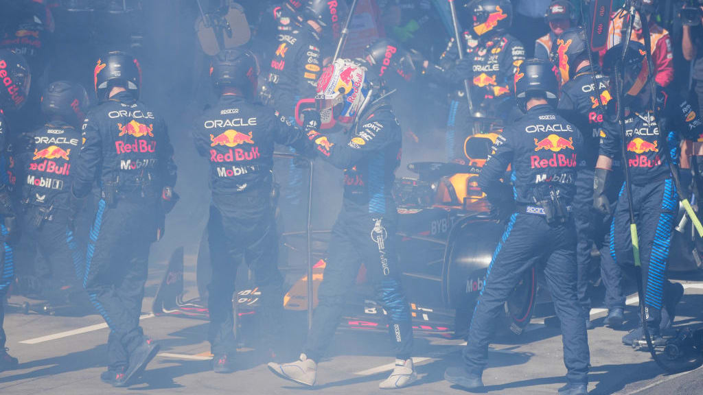 Red Bull Racing's Dutch driver Max Verstappen gets out of his smoking car after retiring during the