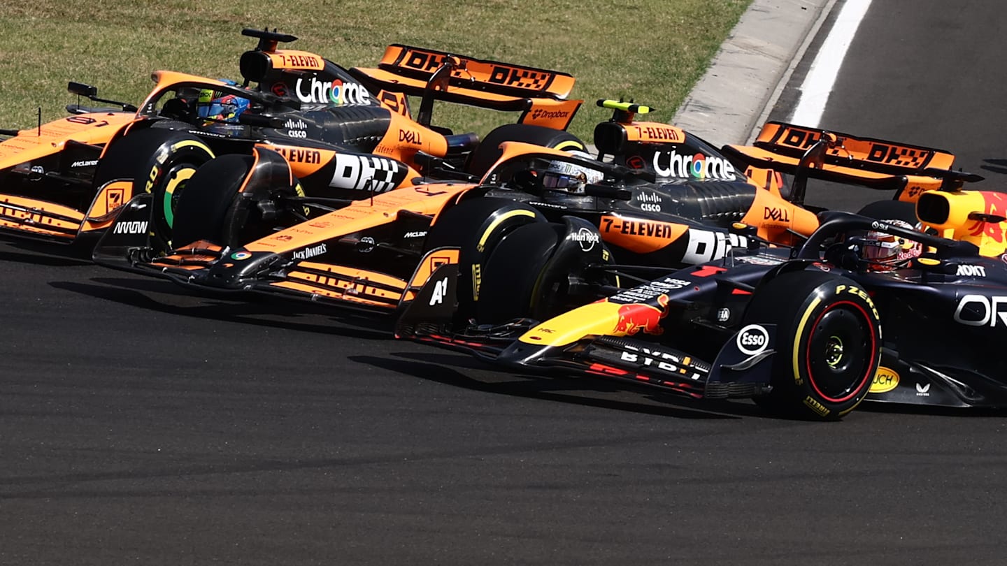 Max Verstappen of Red Bull Racing, Lando Norris and Oscar Piastri of McLaren at start of the