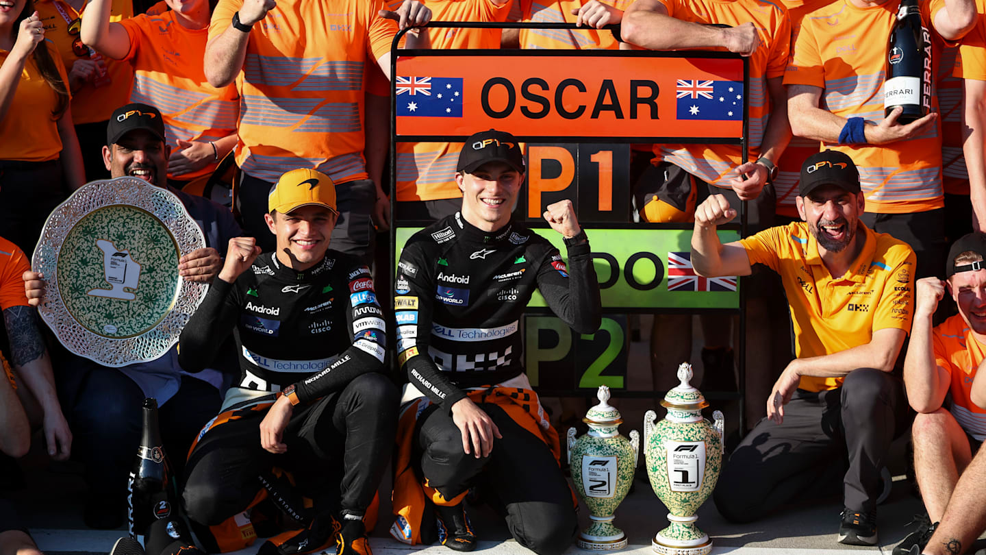 BUDAPEST, HUNGARY - JULY 21: Lando Norris of Great Britain and McLaren F1 Team (left) and Oscar