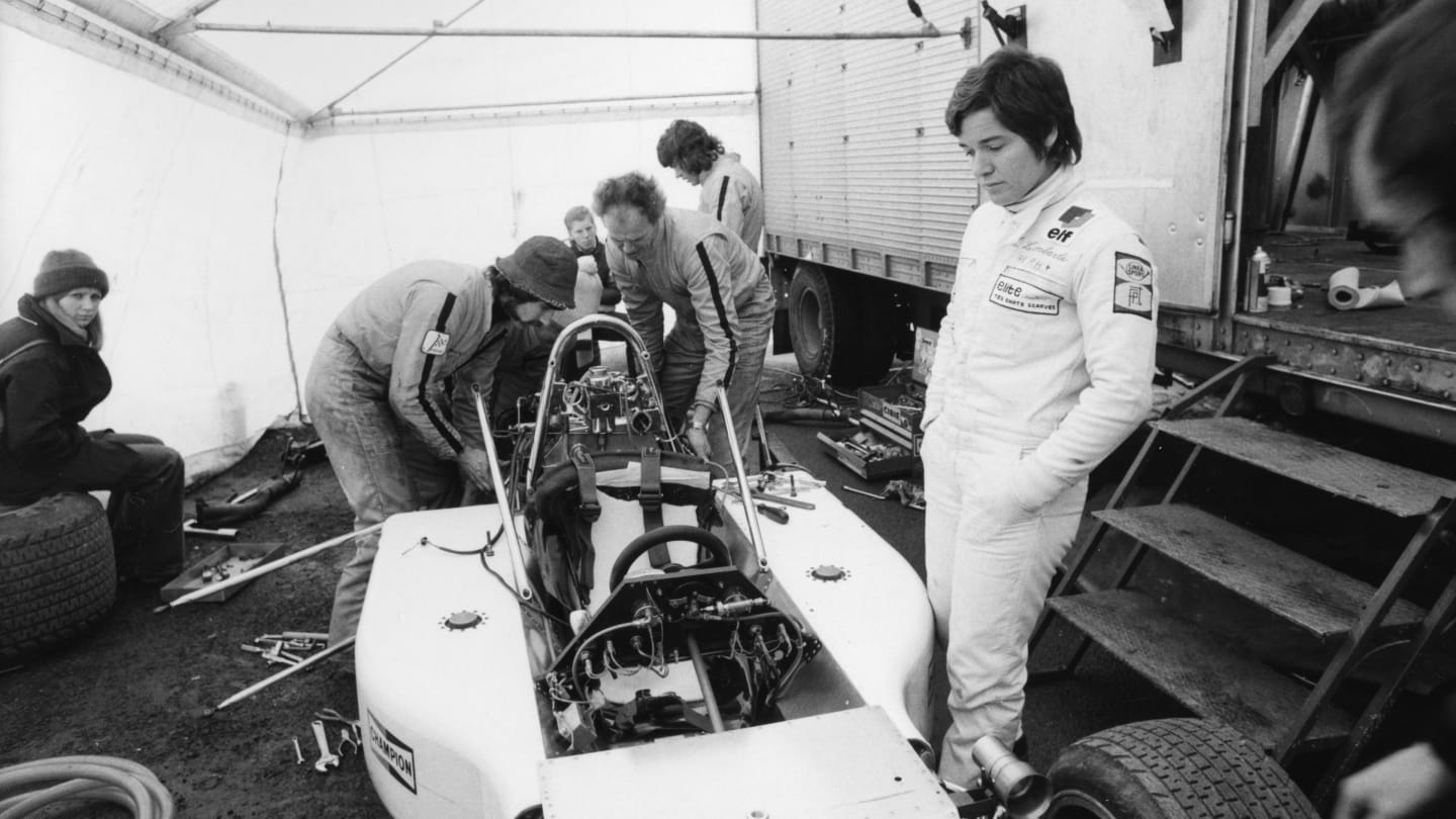 Lella Lombardi (1941-1992) looking at her March Formula 1 before racing at Brands Hatch March 27,