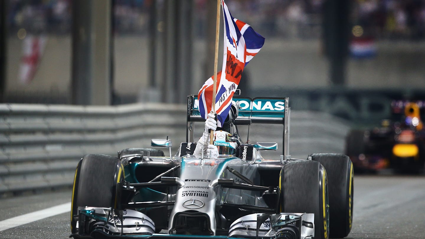 ABU DHABI, UNITED ARAB EMIRATES - NOVEMBER 23:  Lewis Hamilton of Great Britain and Mercedes GP