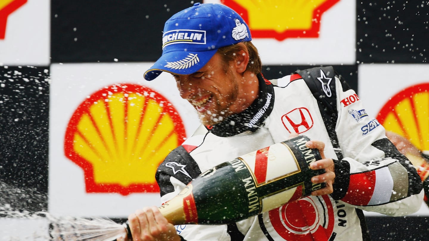 BUDAPEST, HUNGARY - AUGUST 6:  Jenson Button of Great Britain and Honda Racing celebrates victory