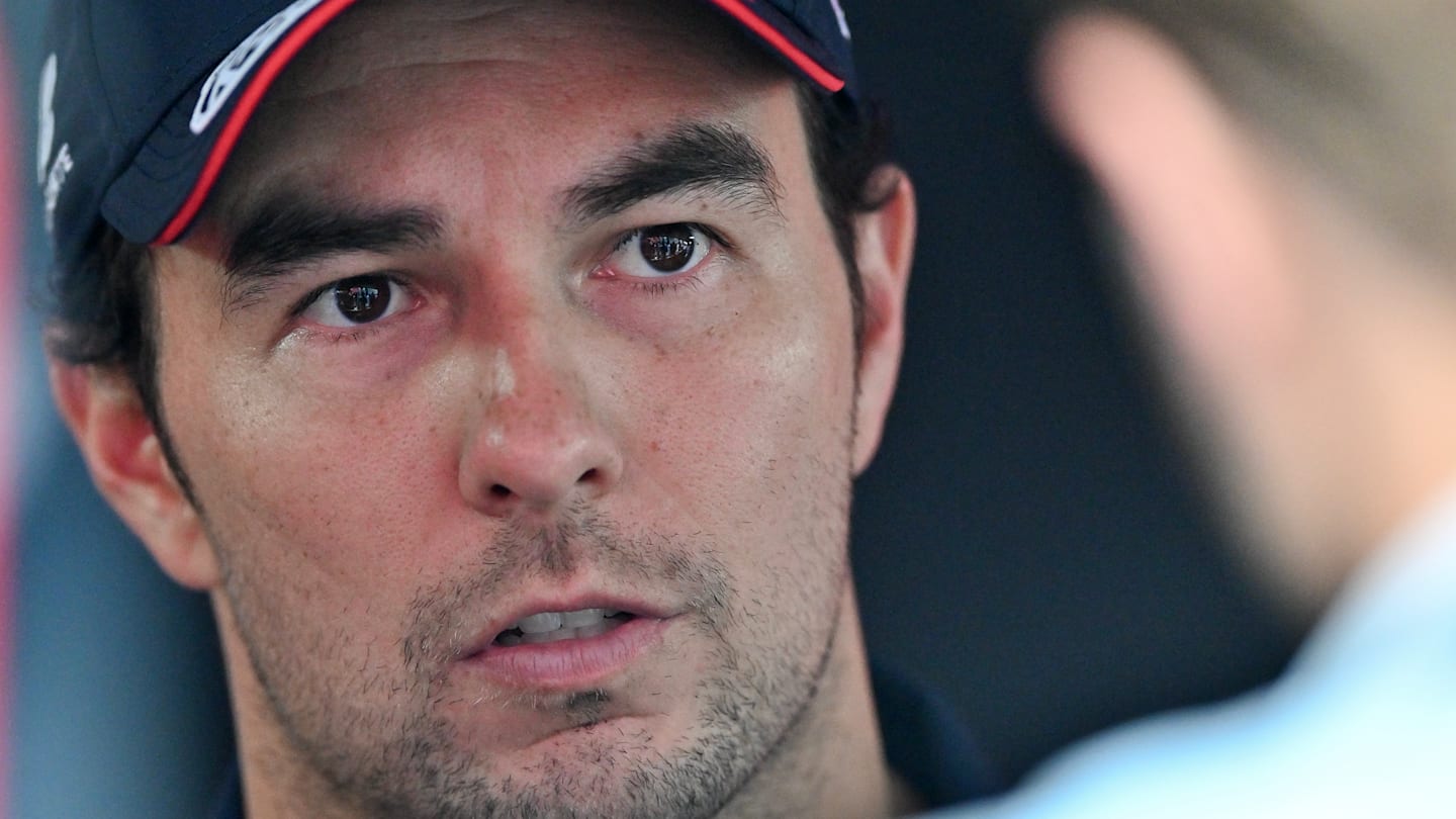 SPA, BELGIUM - JULY 28: Sergio Perez of Mexico and Oracle Red Bull Racing looks on from the grid