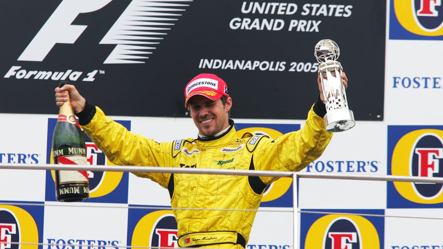 Third place finisher Tiago Monteiro (POR) Jordan on the podium. Formula One World Championship, Rd