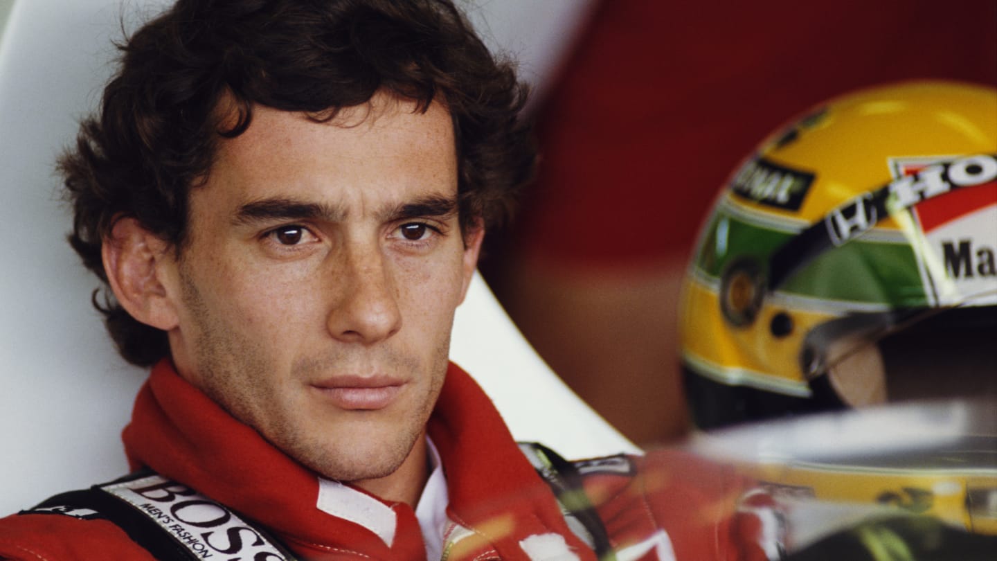 Portrait of Ayrton Senna of Brazil as he sits aboard the #1 Honda Marlboro McLaren McLaren MP4/5