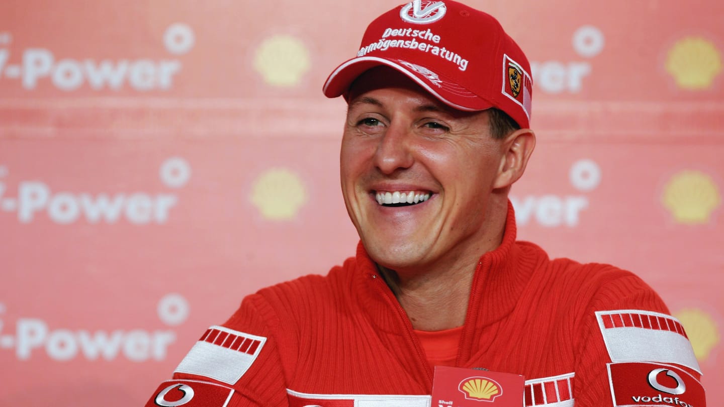 SAO PAULO, BRAZIL - OCTOBER 19:  Michael Schumacher of Germany and Ferrari talks to the media