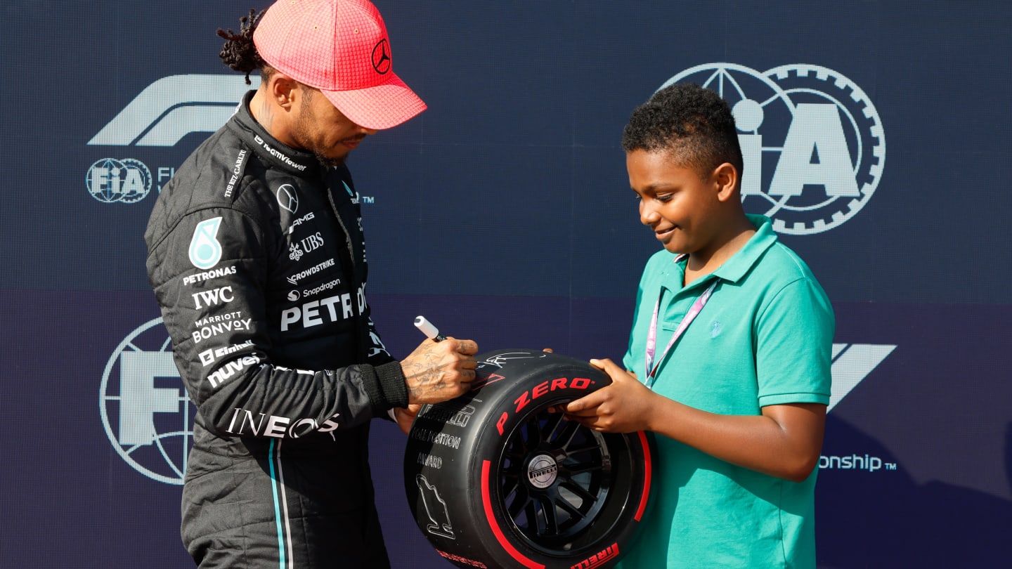 HUNGARORING, HUNGARY - JULY 22: Pole man Sir Lewis Hamilton, Mercedes-AMG, is presented with his
