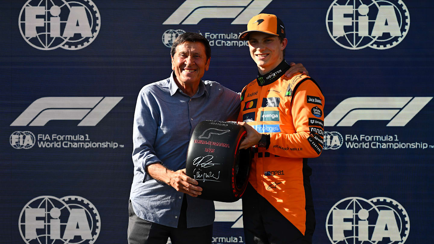 IMOLA, ITALY - MAY 17: Oscar Piastri of Australia and McLaren is presented with the Pirelli Pole