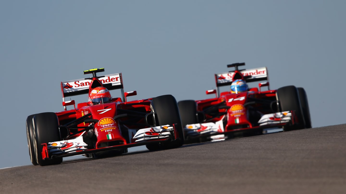 AUSTIN, TX - NOVEMBER 01:  Fernando Alonso of Spain and Ferrari and Kimi Raikkonen of Finland and