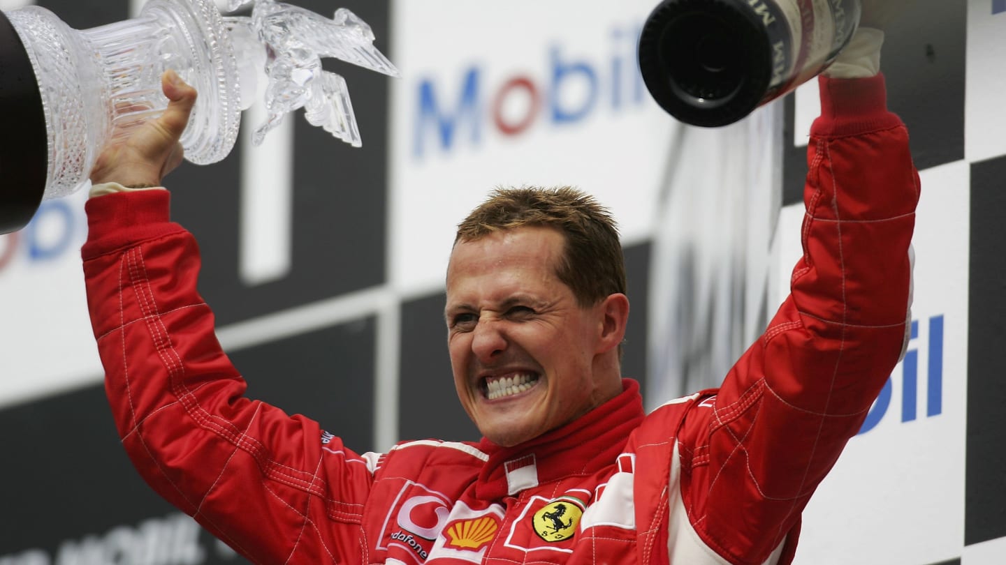 HOCKENHEIM, GERMANY - JULY 30:  Michael Schumacher of Germany and Ferrari celebrates on the podium