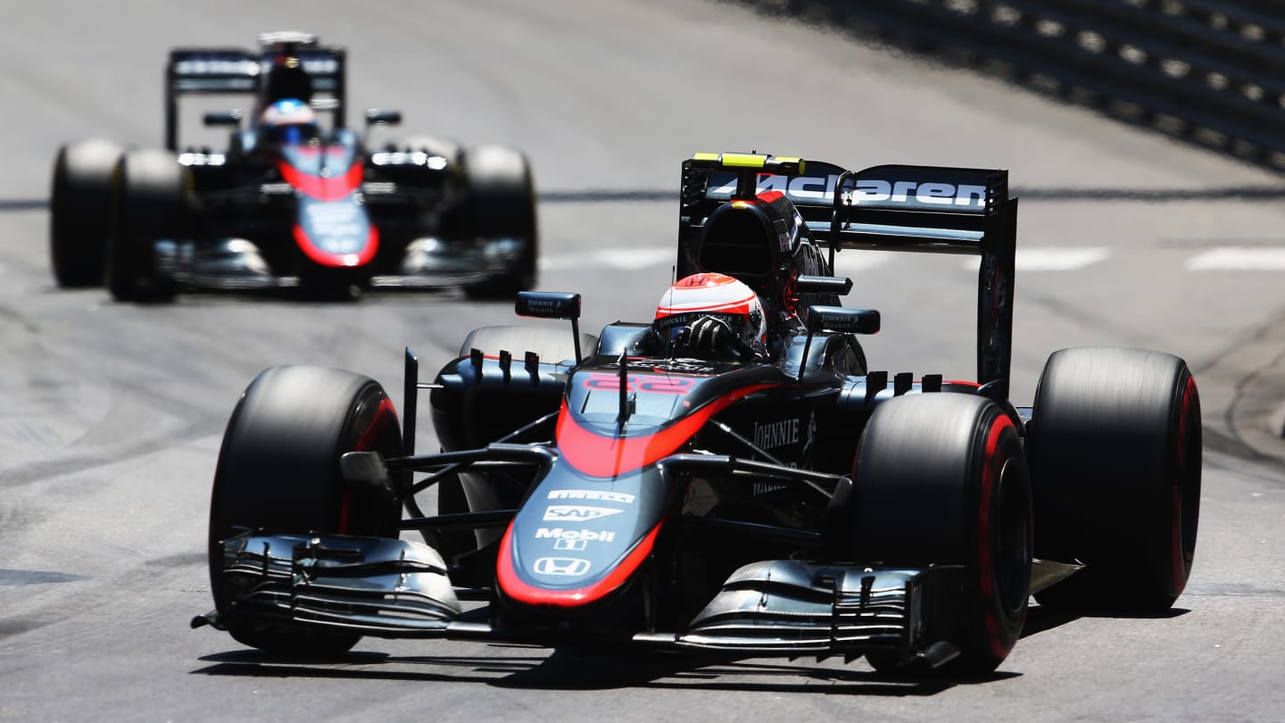 MONTE-CARLO, MONACO - MAY 24:  Jenson Button of Great Britain and McLaren Honda leads from team