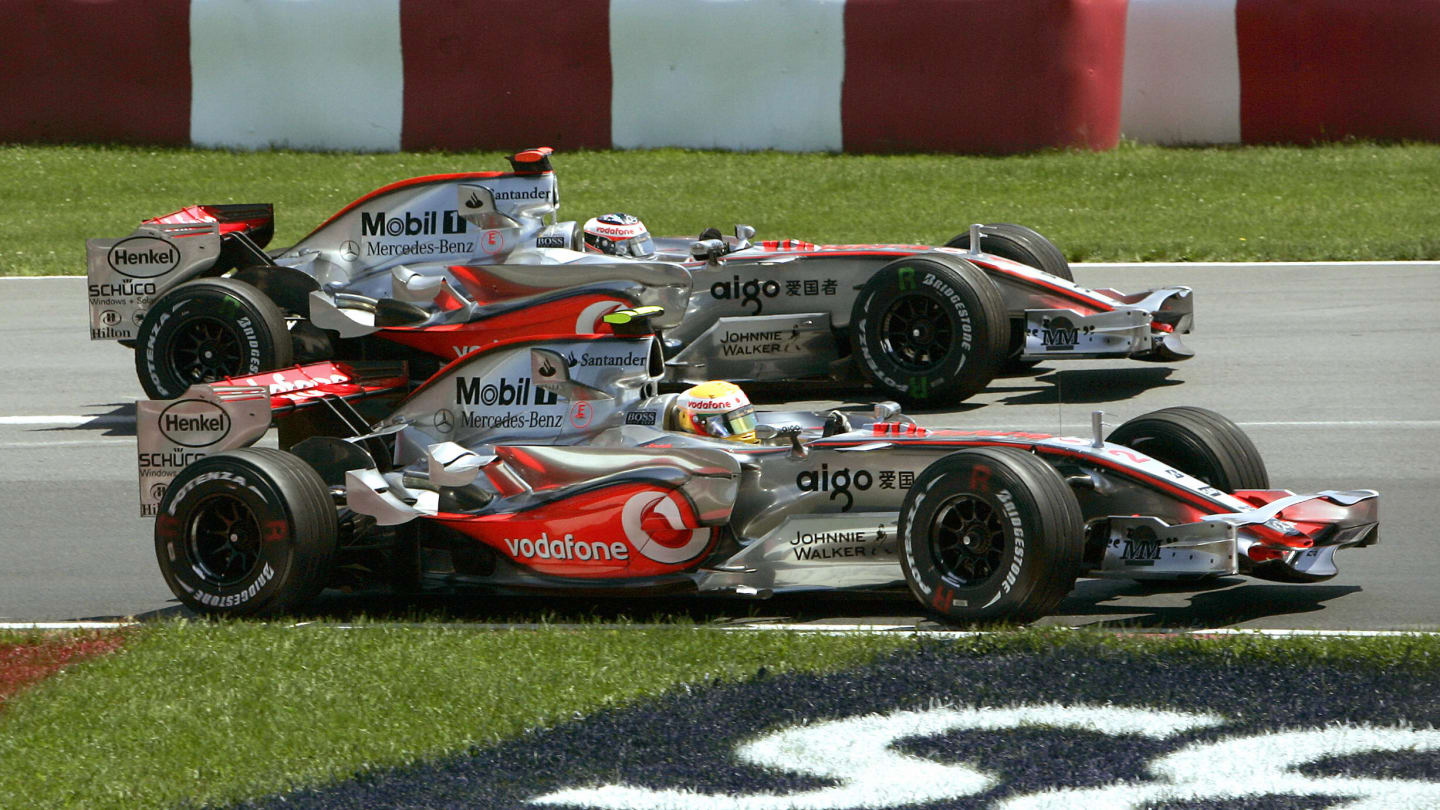Montreal, CANADA: Pole sitter British driver Lewis Hamilton of Team McLaren passes teammate Spanish