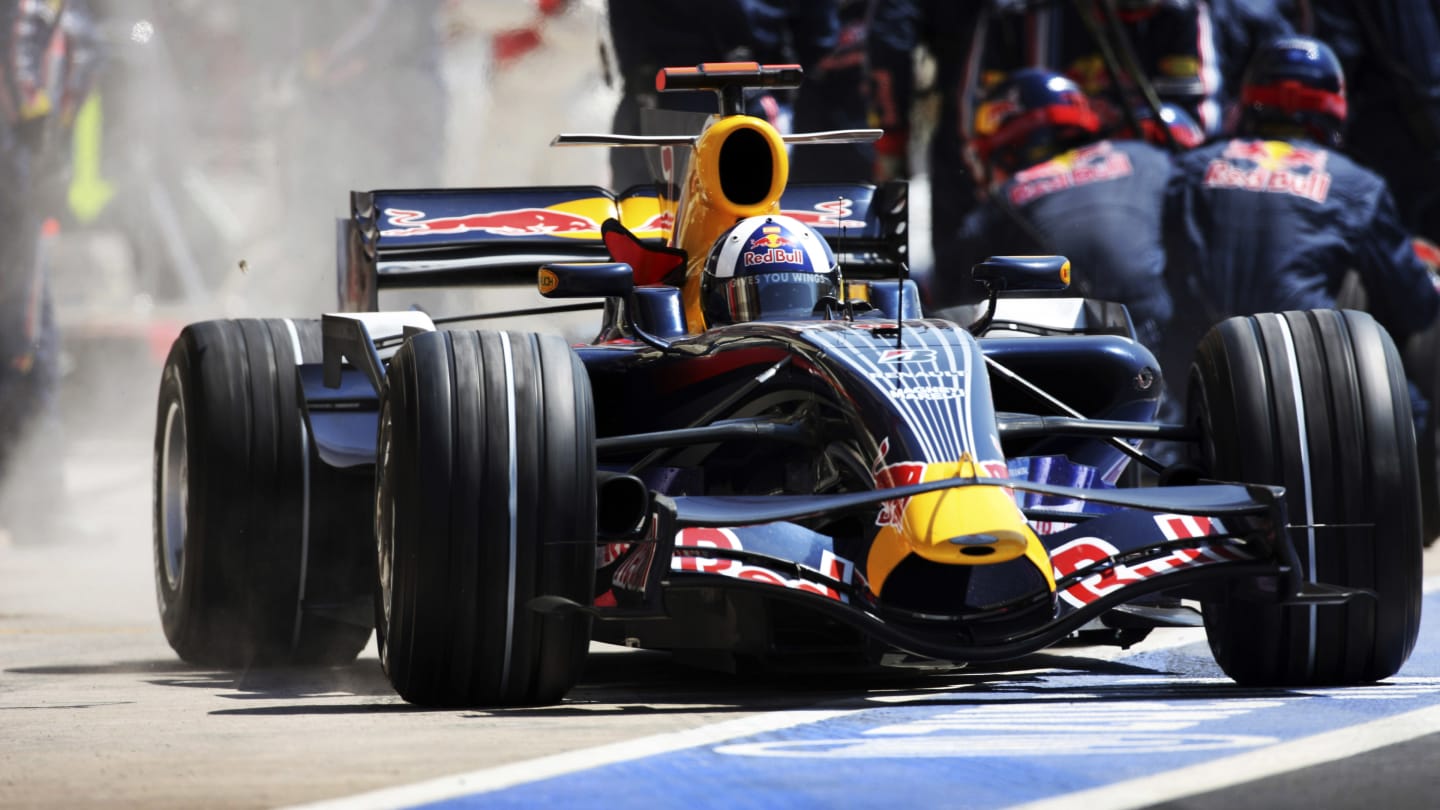 British Red Bull Racing Driver David Coulthard driving his Red Bull Racing RB4 car leaves his pits
