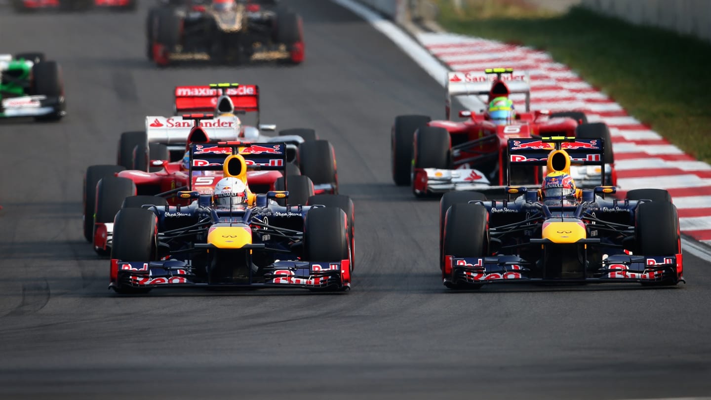 YEONGAM-GUN, SOUTH KOREA - OCTOBER 14:  Sebastian Vettel (L) of Germany and Red Bull Racing and