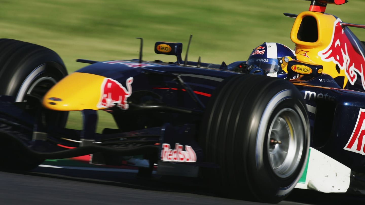 SUZUKA, JAPAN - OCTOBER 08:  David Coulthard of Great Britain and Red Bull Racing in action during