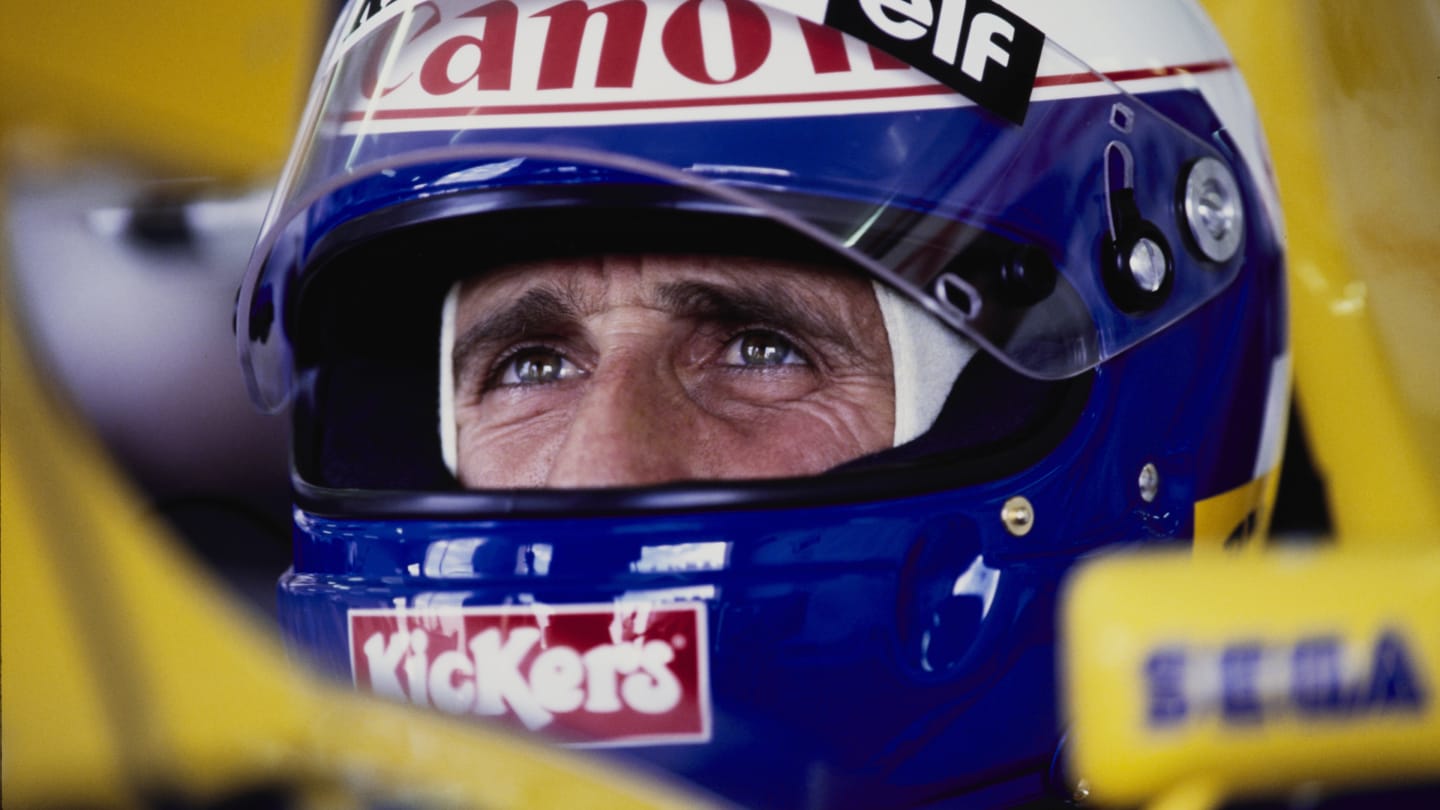 Alain Prost from France checks the lap times from the cockpit of the #2 Canon Williams Renault