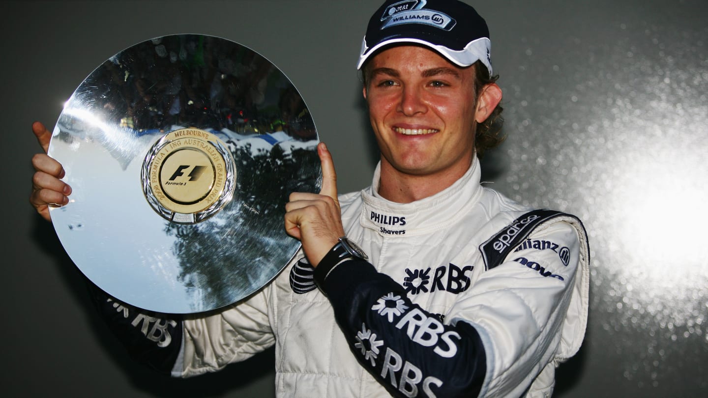 MELBOURNE, AUSTRALIA - MARCH 16:  Nico Rosberg of Germany and Williams celebrates with his trophy