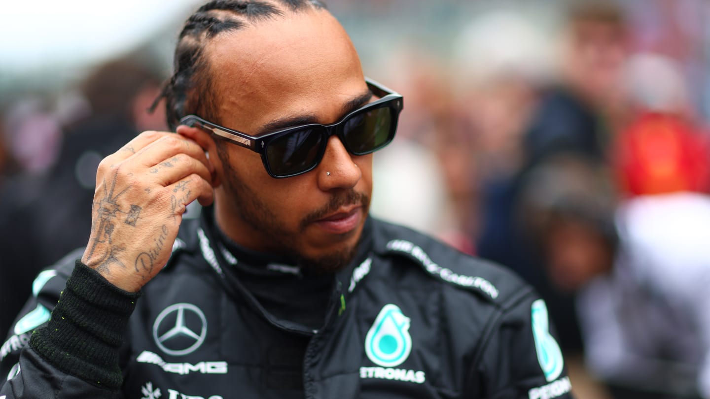 SPA, BELGIUM - JULY 30: Lewis Hamilton of Great Britain and Mercedes prepares to drive on the grid