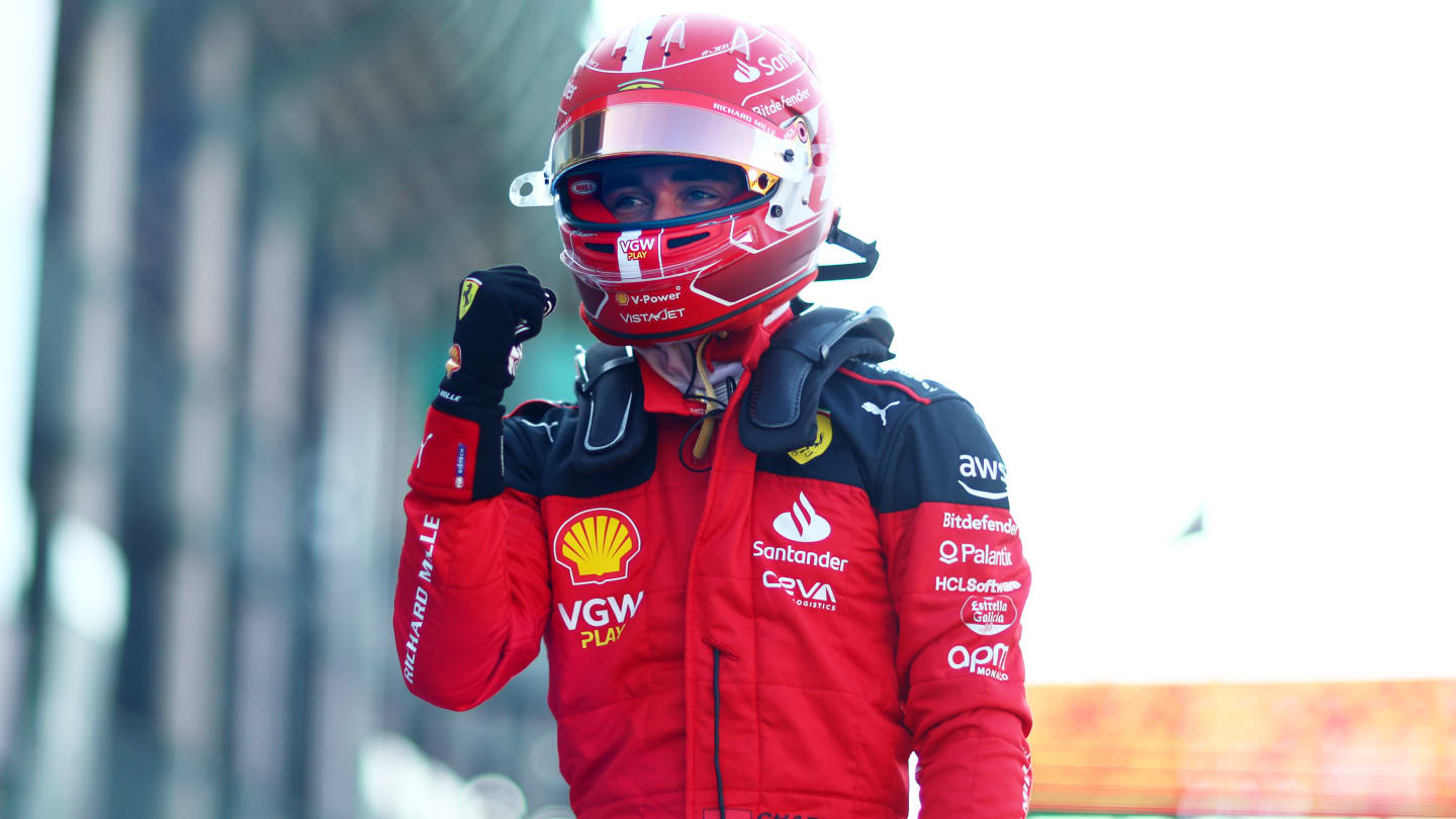 MEXICO CITY, MEXICO - OCTOBER 28: Charles Leclerc of Monaco and Ferrari looks on in the garage