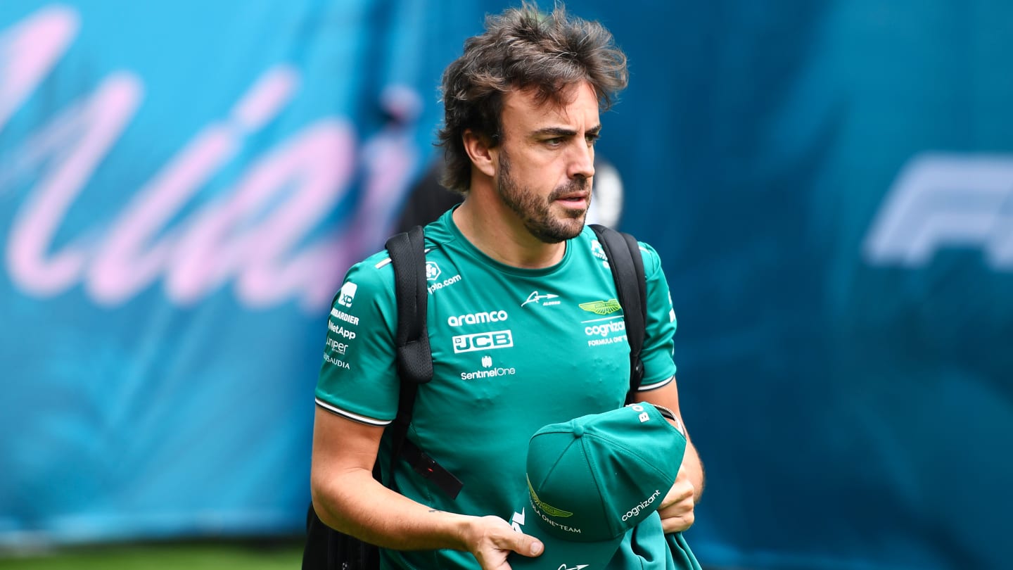 MIAMI, FLORIDA - MAY 07: Fernando Alonso of Spain and Aston Martin F1 Team walks in the Paddock