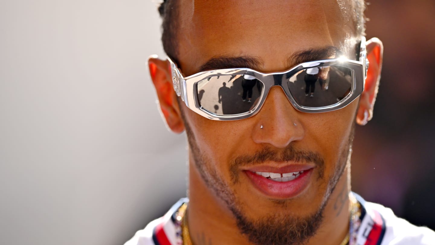 MONTE-CARLO, MONACO - MAY 27: Lewis Hamilton of Great Britain and Mercedes walks in the Paddock