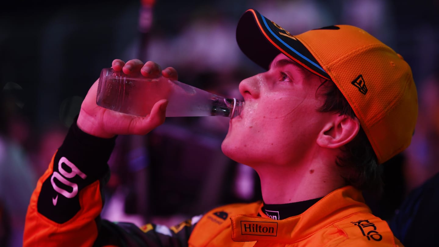 LUSAIL CITY, QATAR - OCTOBER 07: Sprint winner Oscar Piastri of Australia and McLaren takes a drink