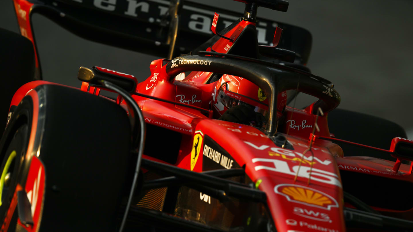 SINGAPORE, SINGAPORE - SEPTEMBER 15: Charles Leclerc of Monaco driving the (16) Ferrari SF-23 on