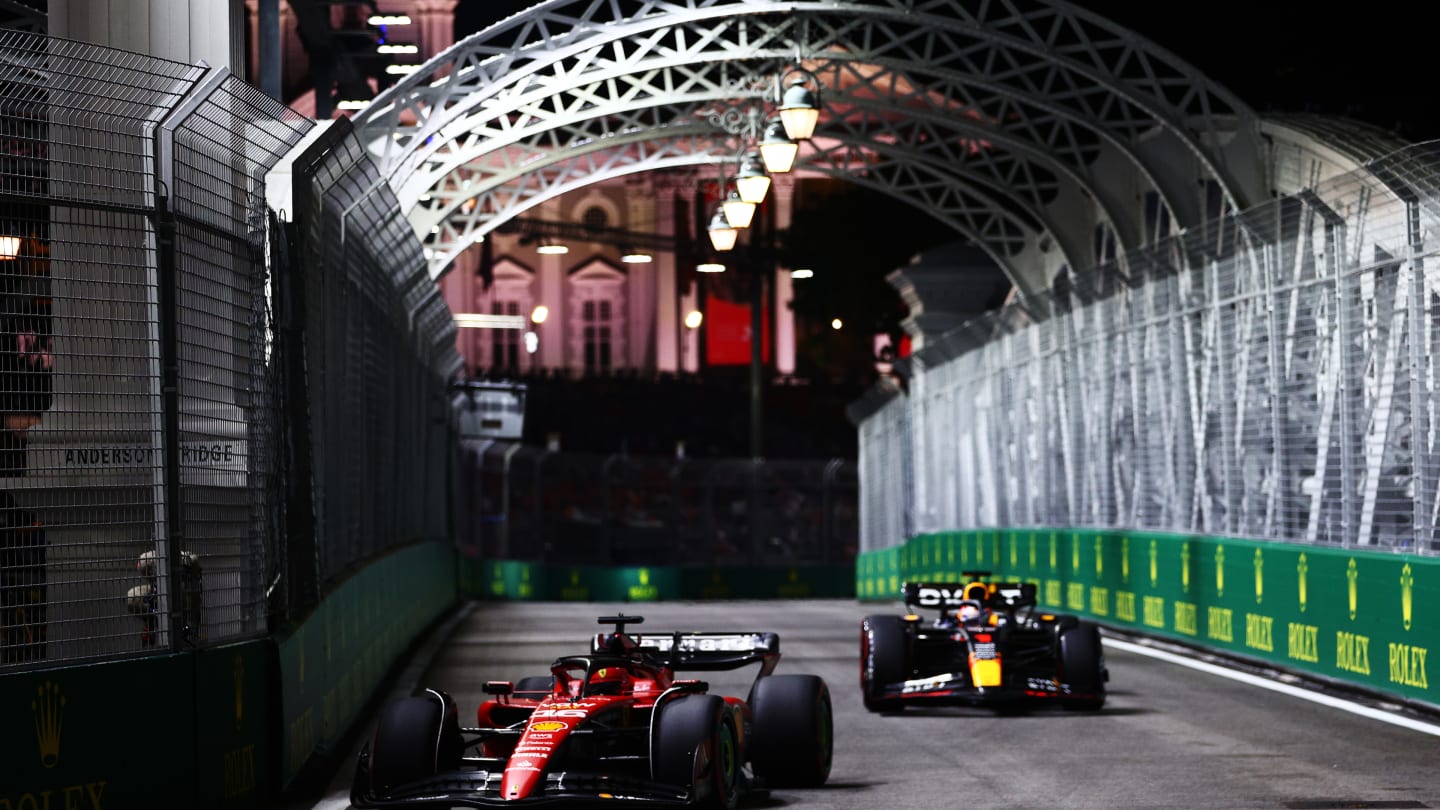 SINGAPORE, SINGAPORE - SEPTEMBER 15: Charles Leclerc of Monaco driving the (16) Ferrari SF-23 leads