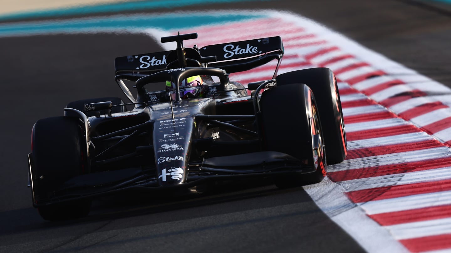 ABU DHABI, UNITED ARAB EMIRATES - NOVEMBER 28: Zhou Guanyu of China driving the (24) Alfa Romeo F1