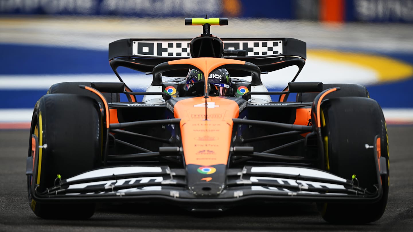 SINGAPORE, SINGAPORE - SEPTEMBER 21: Lando Norris of Great Britain driving the (4) McLaren MCL38