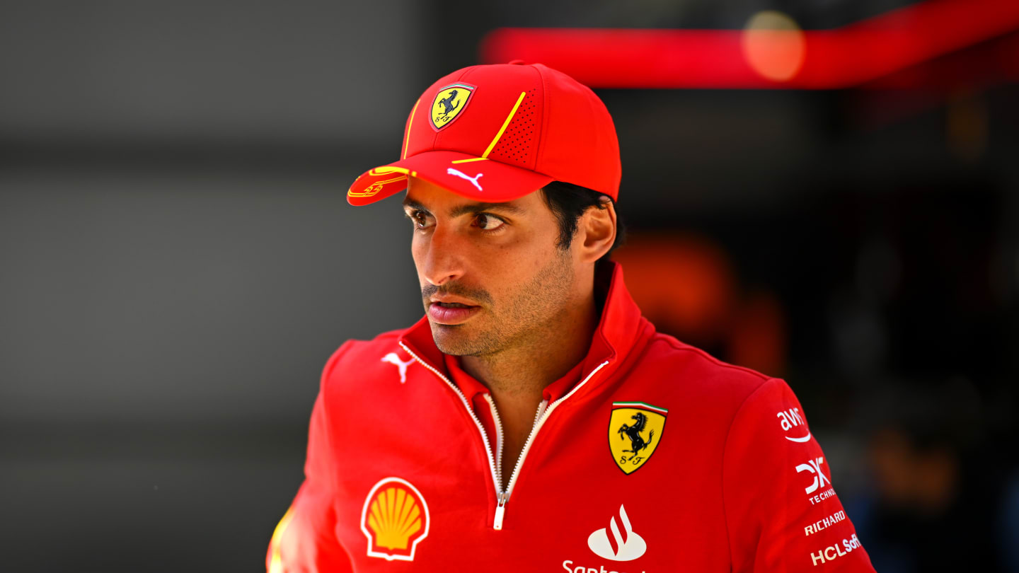 MELBOURNE, AUSTRALIA - MARCH 21: Carlos Sainz of Spain and Ferrari looks on in the Paddock during