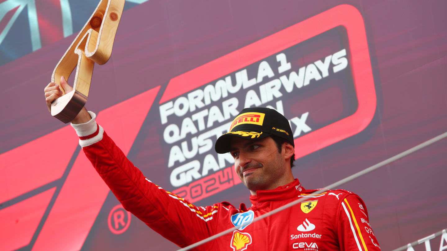 SPIELBERG, AUSTRIA - JUNE 30: Third placed Carlos Sainz of Spain and Ferrari celebrates on the