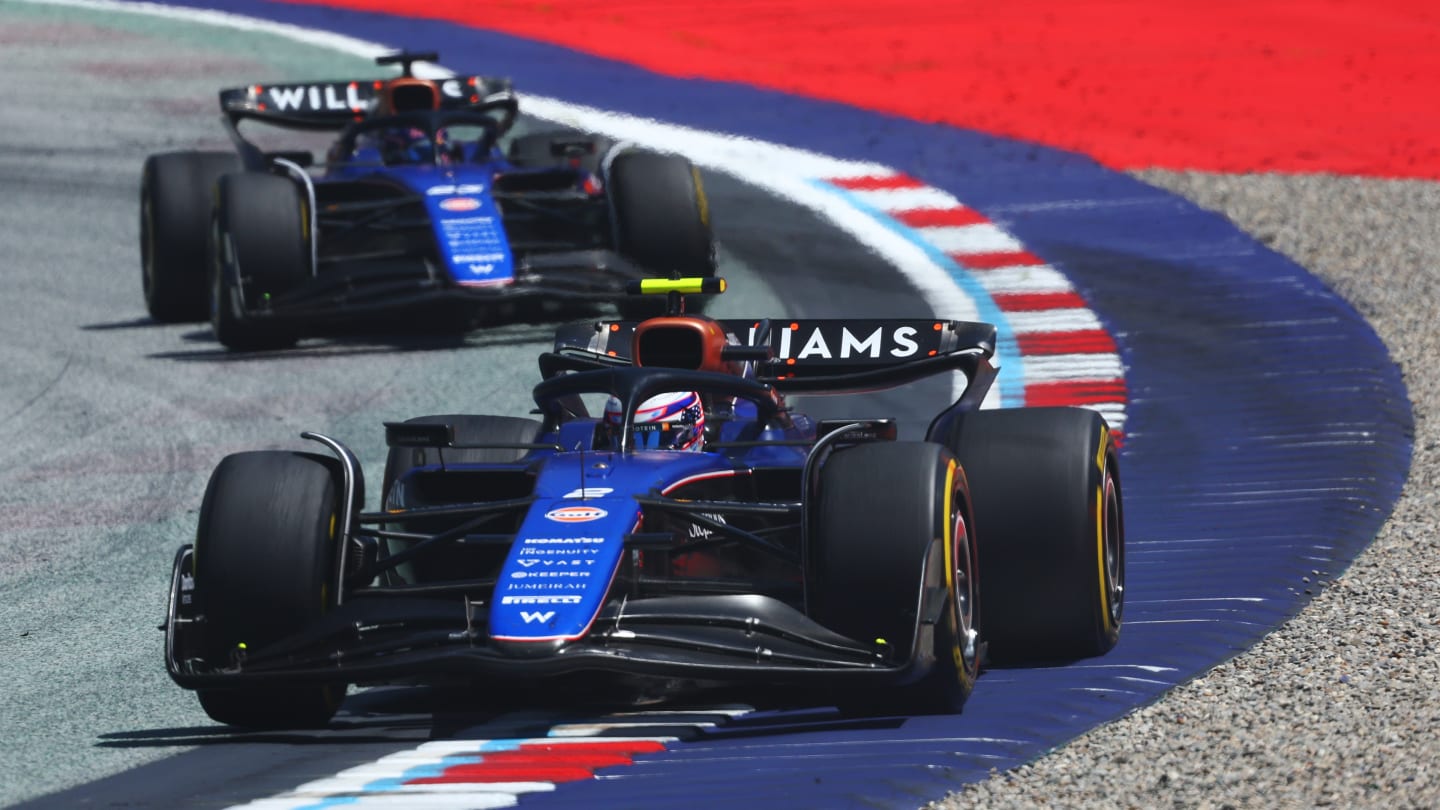 SPIELBERG, AUSTRIA - JUNE 29: Logan Sargeant of United States driving the (2) Williams FW46 Mercedes leads Alexander Albon of Thailand driving the (23) Williams FW46 Mercedes during the Sprint ahead of the F1 Grand Prix of Austria at Red Bull Ring on June 29, 2024 in Spielberg, Austria. (Photo by Clive Rose/Getty Images)