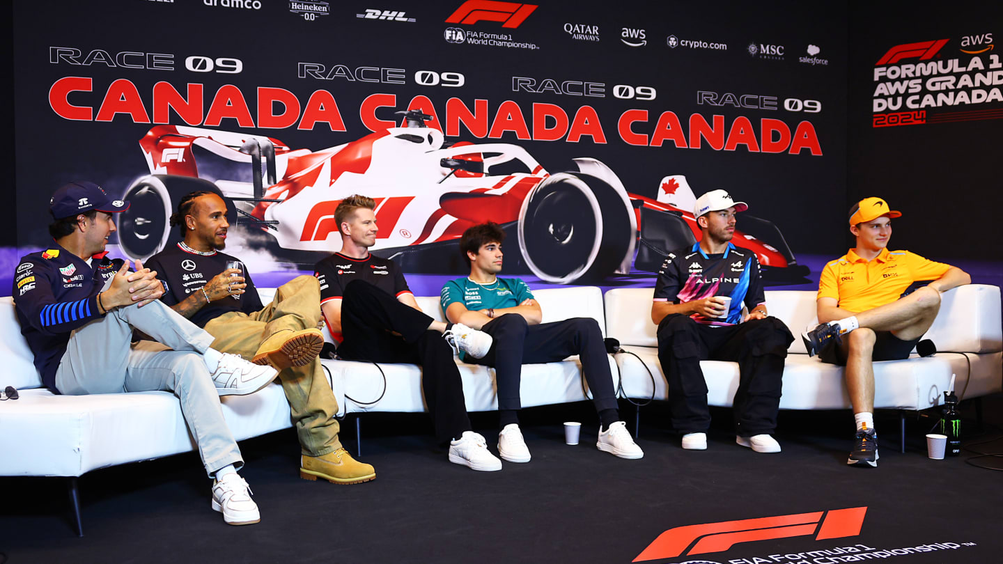 MONTREAL, QUEBEC - JUNE 06: Sergio Perez of Mexico and Oracle Red Bull Racing, Lewis Hamilton of