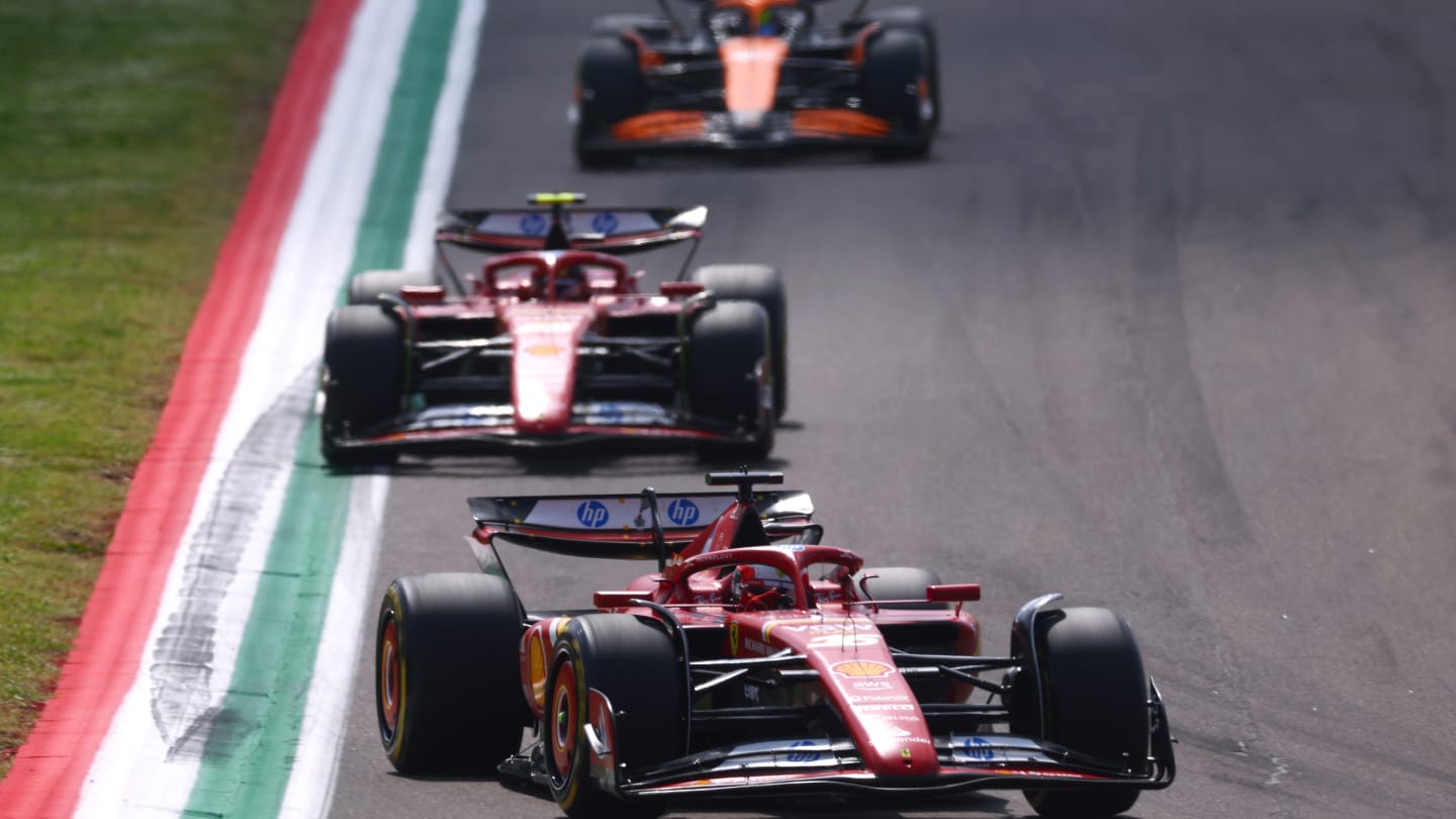 IMOLA, ITALY - MAY 19: Charles Leclerc of Monaco driving the (16) Ferrari SF-24 leads Carlos Sainz
