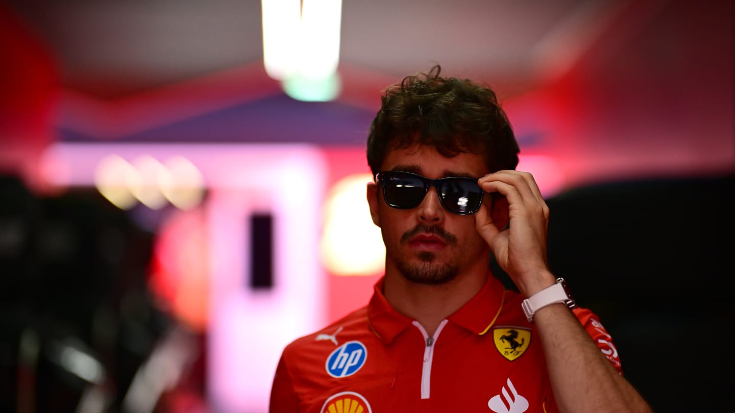 IMOLA, ITALY - MAY 18: Charles Leclerc of Monaco and Ferrari  walks in the Paddock prior to final