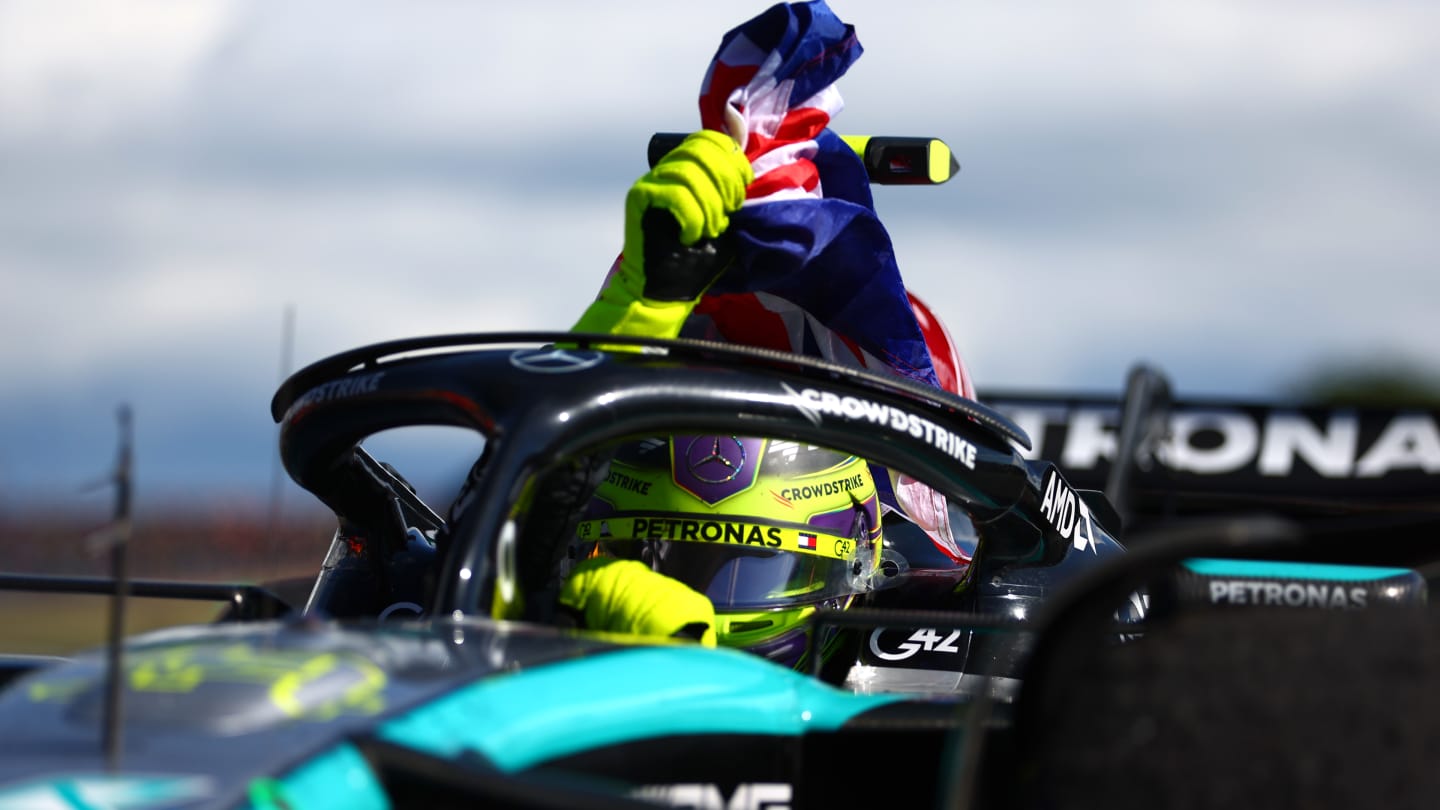 NORTHAMPTON, ENGLAND - JULY 07: Race winner Lewis Hamilton of Great Britain and Mercedes celebrates