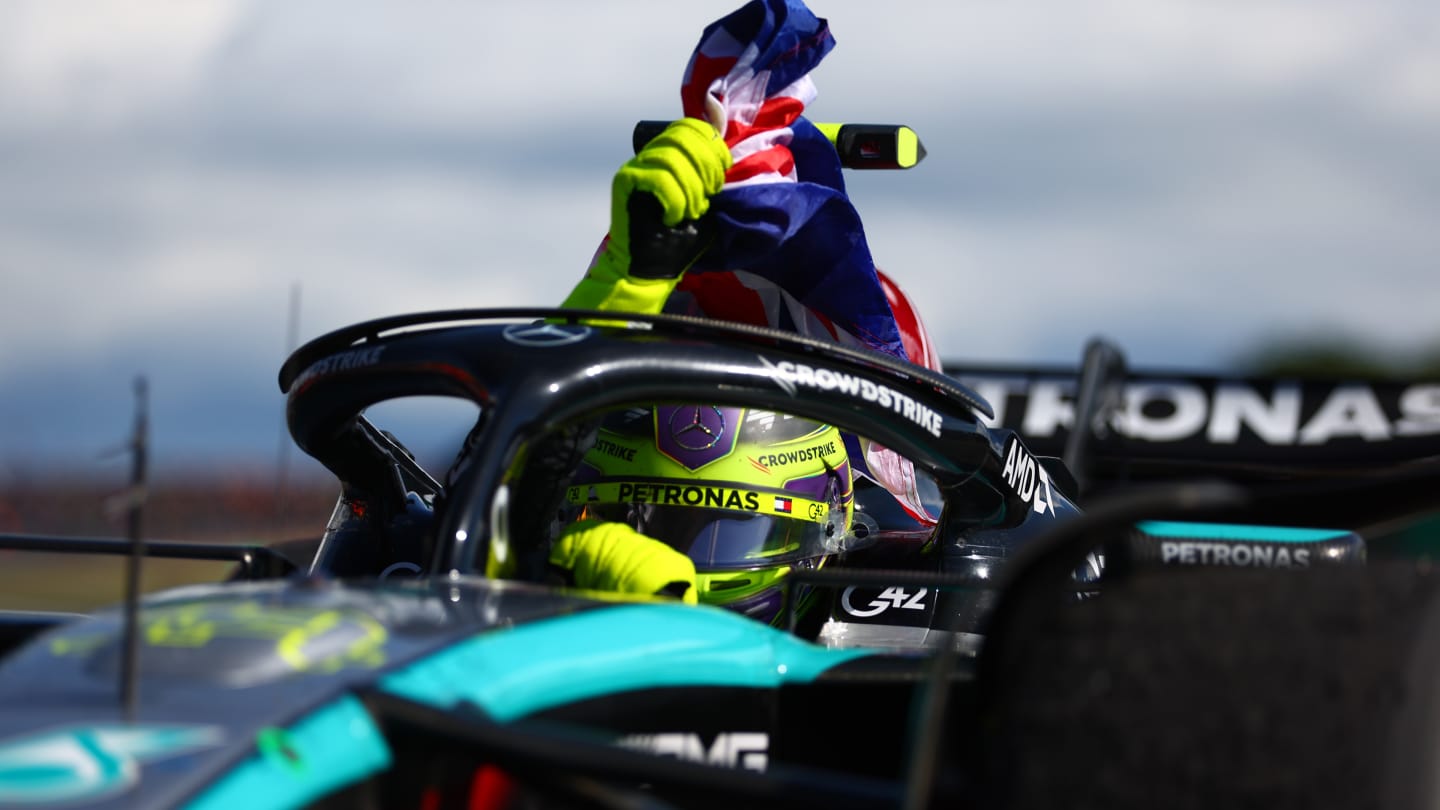 NORTHAMPTON, ENGLAND - JULY 07: Race winner Lewis Hamilton of Great Britain and Mercedes celebrates