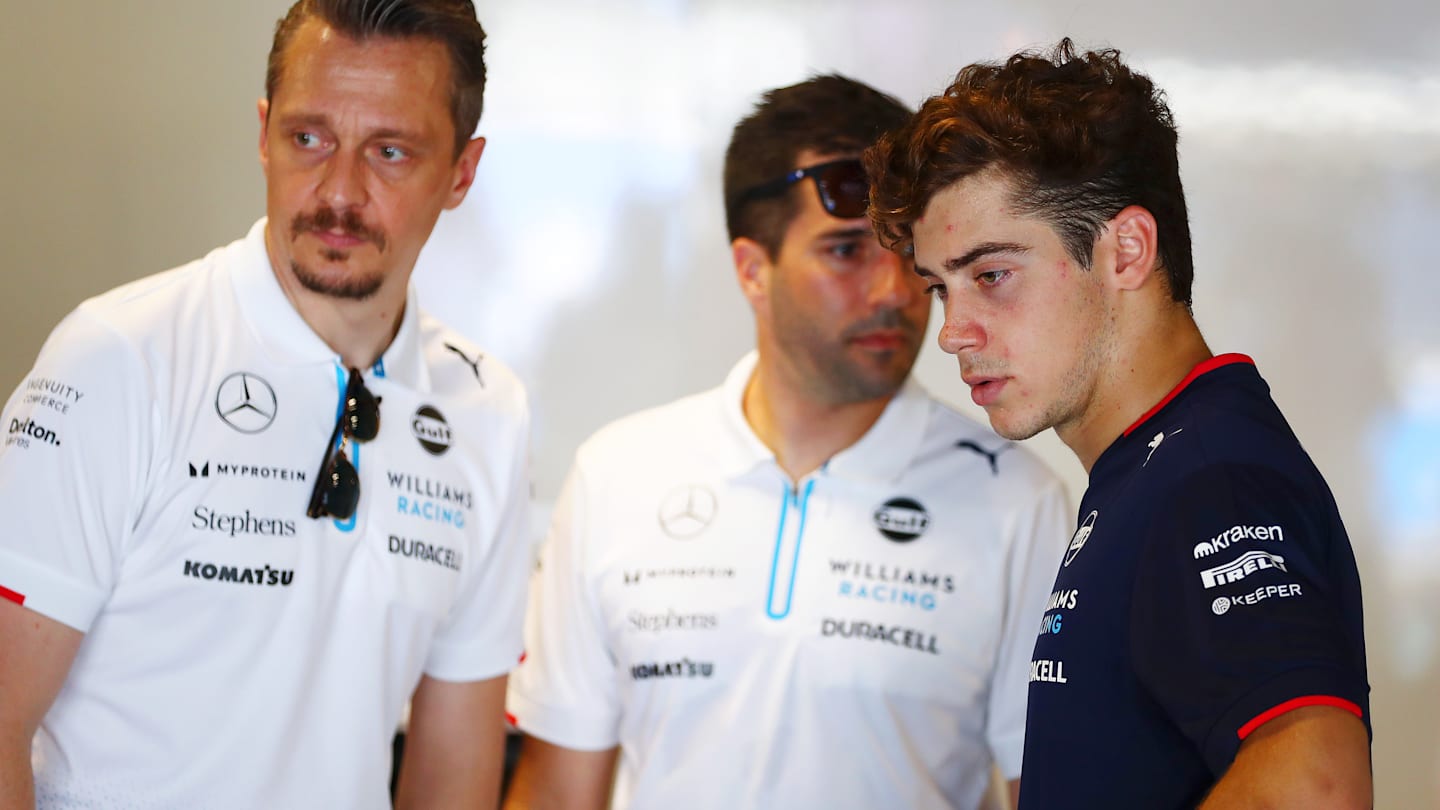 MONZA, ITALY - AUGUST 29: Franco Colapinto of Argentina and Williams talks with Williams team