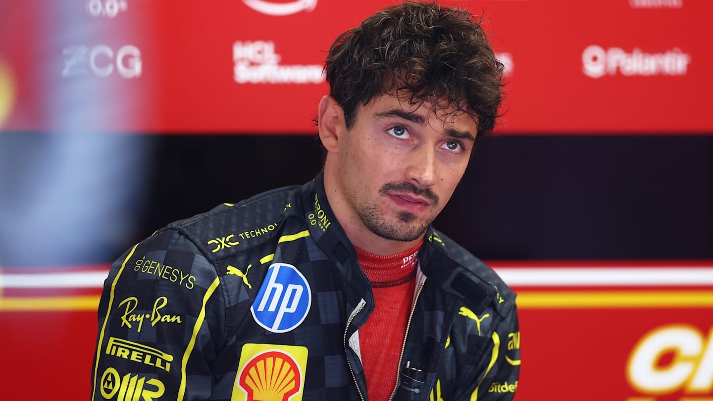 MONZA, ITALY - AUGUST 31: Charles Leclerc of Monaco and Ferrari prepares to drive in the garage