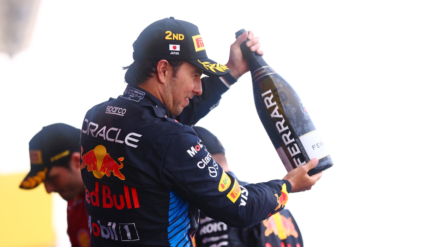 SUZUKA, JAPAN - APRIL 07: Second placed Sergio Perez of Mexico and Oracle Red Bull Racing