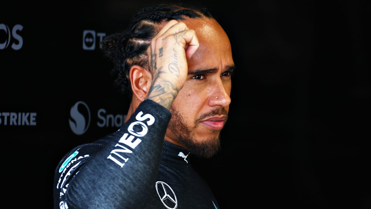 MIAMI, FLORIDA - MAY 03: Lewis Hamilton of Great Britain and Mercedes looks on in the garage prior