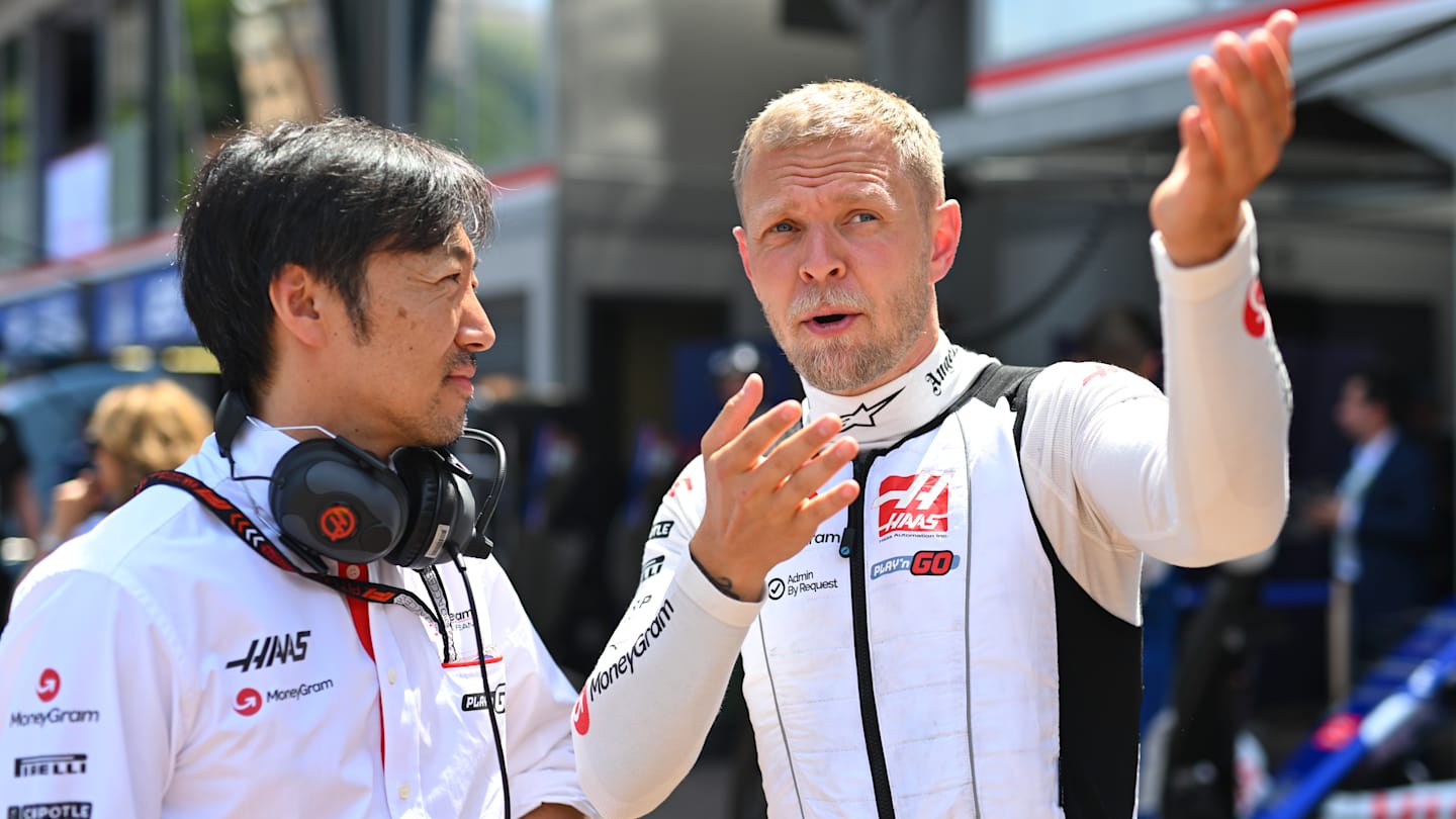 MONTE-CARLO, MONACO - MAY 26: Kevin Magnussen of Denmark and Haas F1 talks with Haas F1 Team