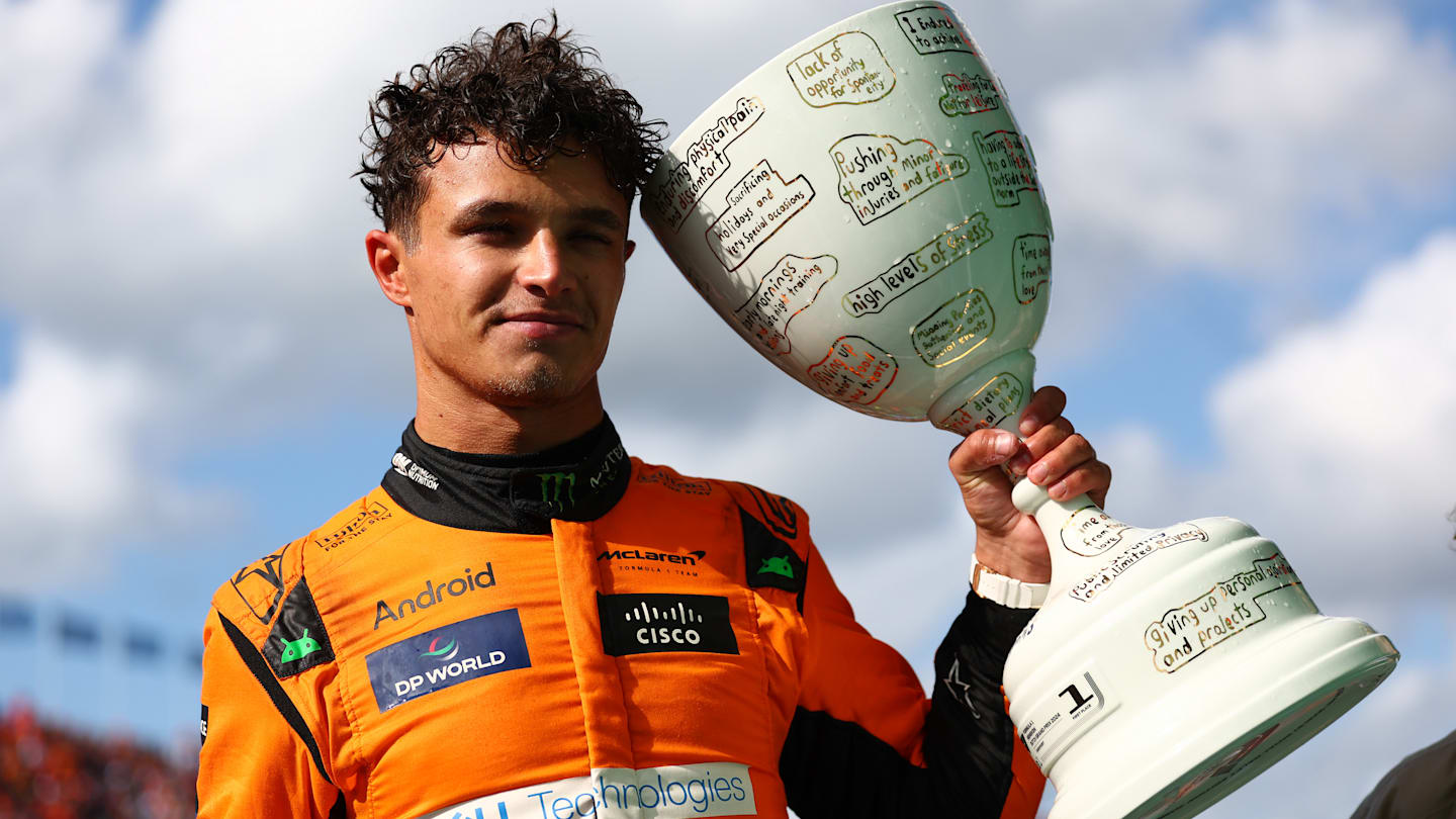 ZANDVOORT, NETHERLANDS - AUGUST 25: Race winner Lando Norris of Great Britain and McLaren poses for