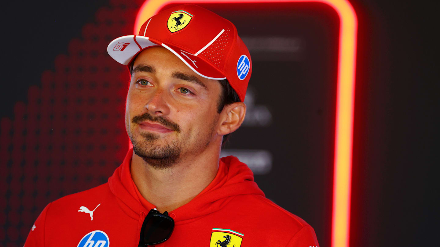 ZANDVOORT, NETHERLANDS - AUGUST 22: Charles Leclerc of Monaco and Ferrari talks to the media in the